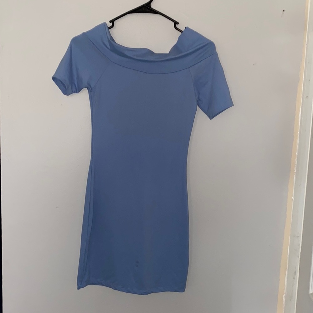 Baby blue no sleeves dress. Never worn. Perfect for baby shower or any event.